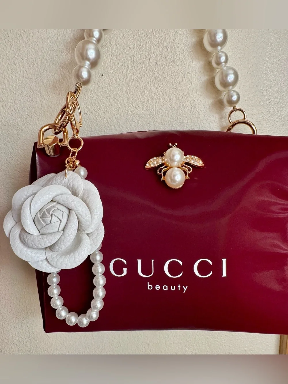 Gucci Burgundy Pearl-Handle Cosmetic Case with Bee Accent